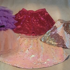 5 Girls Shiny Skirts